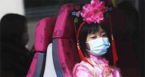 Πρωτοχρονιά στην Κίνα μεν, μέτρα προστασία για τον ιό δε AP Photo/Achmad Ibrahim